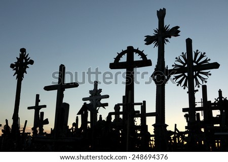 SIAULIAI, LITHUANIA - AUGUST 1, 2013: Wooden crosses at the Hill of Crosses, the most important Lithuanian Catholic pilgrimage site located near the town of Siauliai in Northern Lithuania.