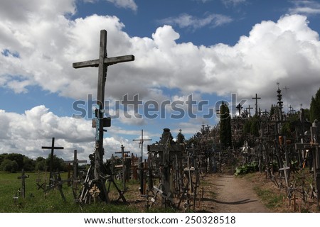 SIAULIAI, LITHUANIA - AUGUST 2, 2013: Wooden crosses at the Hill of Crosses, the most important Lithuanian Catholic pilgrimage site located near the town of Siauliai in Northern Lithuania.