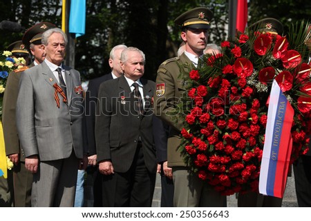 PRAGUE, CZECH REPUBLIC - MAY 9, 2013: Soviet war veterans attend the celebration of Victory Day at the Soviet War Memorial at the Olsany Cemetery in Prague, Czech Republic.