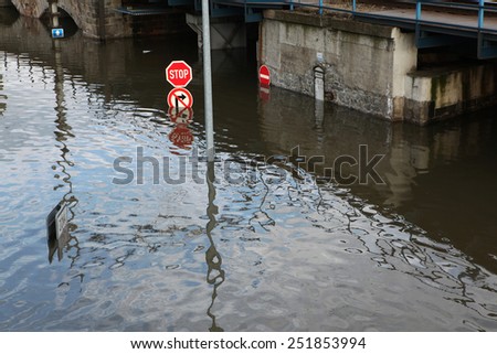 USTI NAD LABEM, CZECH REPUBLIC - JUNE 5, 2013: Stop and No right turn, traffic signs flooded by the swollen Elbe River in Usti nad Labem, Northern Bohemia, Czech Republic, on June 5, 2013.