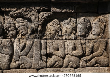 Ascetic men. Stone bas relief from the Borobudur Temle in Central Java, Indonesia.