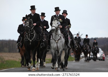 CROSTWITZ, GERMANY - APRIL 8, 2012: Easter Riders attend the Easter ceremonial equestrian procession in the Lusatian village of Crostwitz near Bautzen, Upper Lusatia, Saxony, Germany.
