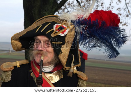 TVAROZNA, CZECH REPUBLIC  DECEMBER 4, 2011: Elderly re-enactor uniformed as a French soldier attends the re-enactment of the Battle of Austerlitz (1805) near Tvarozna, Czech Republic.