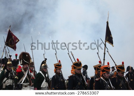 TVAROZNA, CZECH REPUBLIC  DECEMBER 3, 2011: Re-enactors uniformed as French soldiers attend the re-enactment of the Battle of Austerlitz (1805) near Tvarozna, Czech Republic.