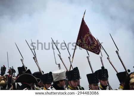 TVAROZNA, CZECH REPUBLIC Ã¢?? DECEMBER 3, 2011: Re-enactors uniformed as French soldiers attend the re-enactment of the Battle of Austerlitz (1805) near Tvarozna, Czech Republic.