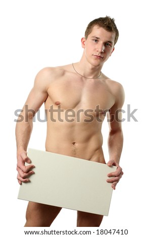 stock photo Young muscular nude man covering a copy space blank billboard