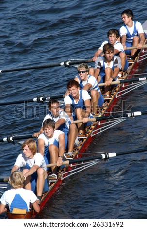 PRAGUE - JUNE 6: A junior rowing team in action during a boat-race in Prague, Czech Republic, on June 6, 2008