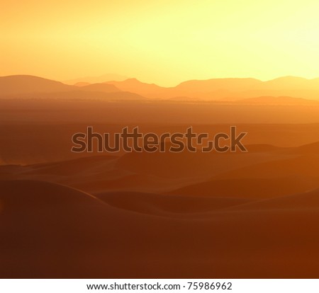 Sunset over the sand dunes of Erg Chebbi in the Sahara Desert near Merzouga, Morocco.