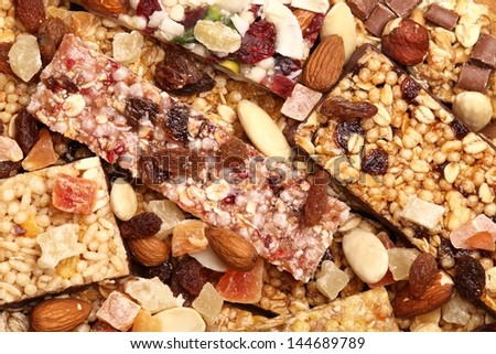 Close-up of various cereal bars with dry fruits and nuts