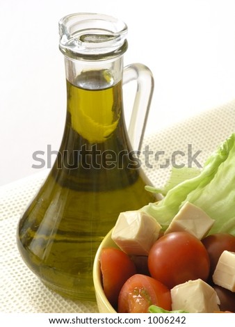 Olive oil and vegetable salad with cheese