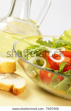 Vegetable salad, bread and cooking oil