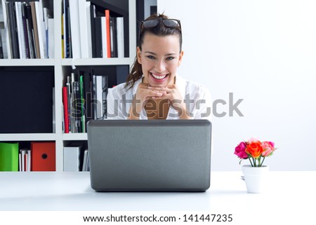 businesswoman browsing internet at office