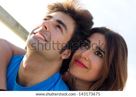 portrait of young couple looking at the horizon