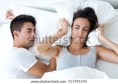 Portrait of woman who can not sleep because her husband snores