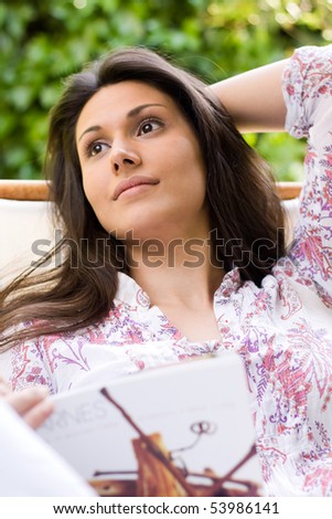 attractive woman relaxing in the garden