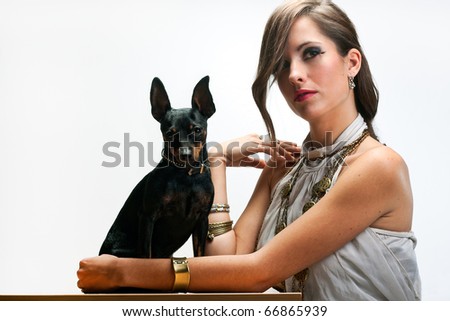 Sophisticated woman with her dogs