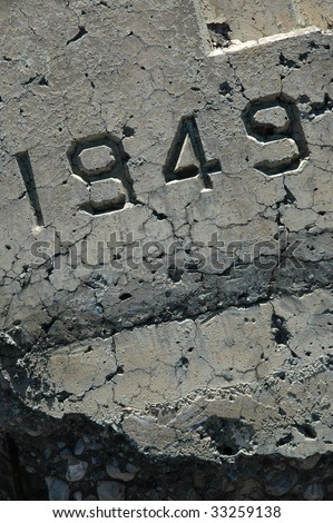 1949 - year engraved in broken concrete slab