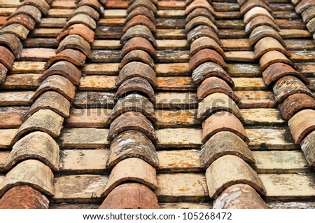 Perspective of old red roof clay tiles