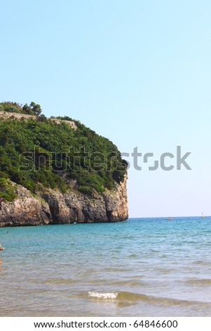 Vertical sheer cliff on the coastline in Gaeta, Italy