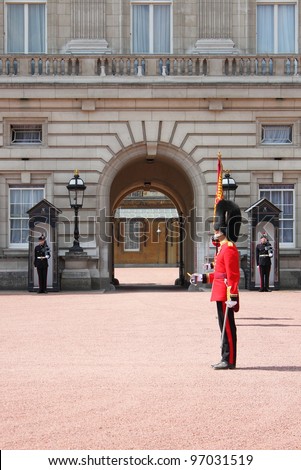 LONDON - MAY 21: British Royal guard performs the Changing of the Guard in Buckingham Palace on May 21, 2010 in London, UK