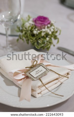 Ceremony silverware and decoration on elegant table