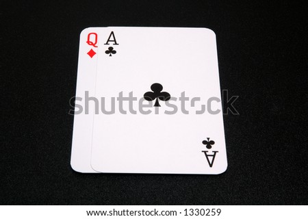 Winning hand of 21 at the game of blackjack, on a black background.
