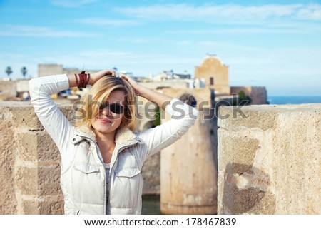Portrait of tourist young adult girl outdoor,Morocco