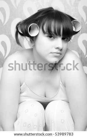 young adult girl with hair rollers black and white