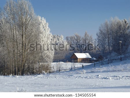 Wooden barn in the winter scenery