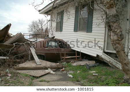 Flooded house on unfortunate little car