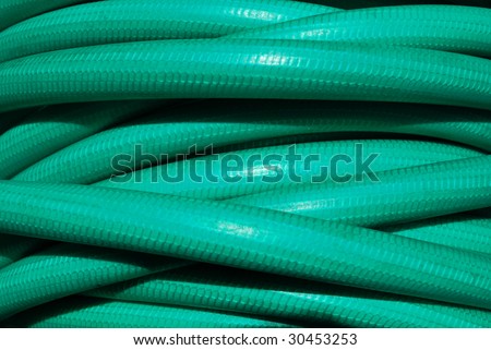 Rolled up water hose