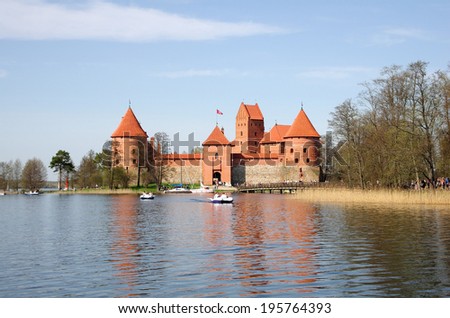 TRAKAI, LITHUANIA - APRIL 28: Castle in Trakai on April 28, 2012. Medieval castle in Trakai, Lithuania. Located on island in the middle of lake is one of the most popular tourist attraction in country