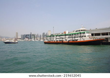 HONG KONG - MARCH 04: Ferry Boat in Victoria harbor on March 04, 2013 in Hong Kong. Hong Kong ferry is in operation in Victoria harbor for more than 120 years