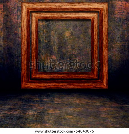 dark grunge frame with old frame on wall