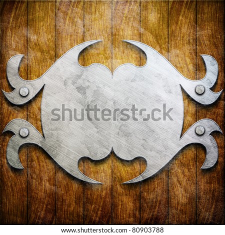 Metal frame on wooden wall (empty signboard)