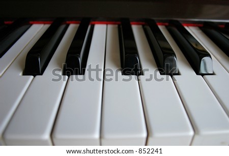 Piano keys from low angle.