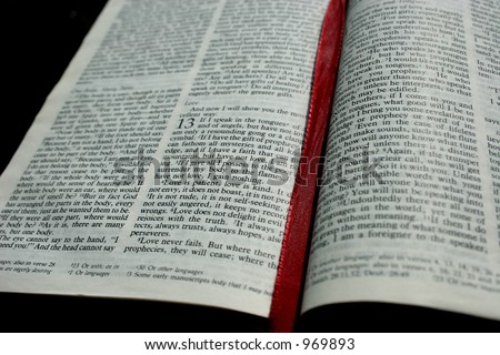 NIV Bible opened to I Corinthians 13, the passage about love.