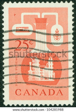 CANADA - CIRCA 1956: A stamp printed in Canada issued to emphasize the importance of the chemical industry in the economy of Canada, circa 1956.