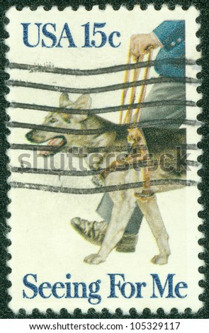 UNITED STATES OF AMERICA - CIRCA 1979 : A stamp printed in the USA shows guide dog, Seeing for me, circa 1979