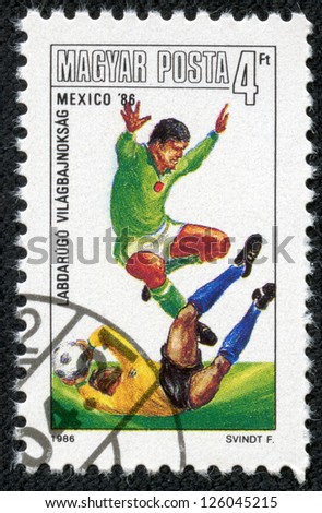 HUNGARY-CIRCA 1986:A post stamp printed in Hungary, shows football players, devoted Football World Cup Championship, Mexico 1986, circa 1986.