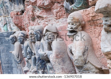 DAZU TOWN CHONGQING CHINA - NOV 23: Ancient Buddhist Hillside Rock Carvings, Ten Austerities of Liu Benzun - November 23,2012 at Baodingshan temple in Dazu town, Chongqing, China