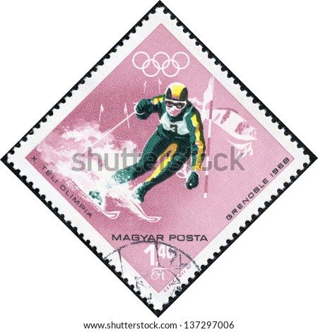 HUNGARY - CIRCA 1968: A stamps printed in Hungary showing an athlete skiing, Winter Olympic sports in Grenoble 1968, circa 1968