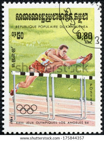 KAMPUCHEA-CIRCA 1984: A stamp printed in the Kampuchea, is dedicated to Summer Olympic Games in Los Angeles, Hurdler, circa 1984