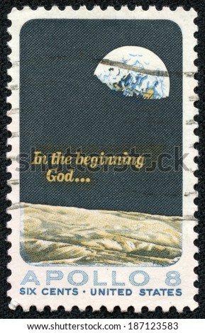 UNITED STATES OF AMERICA - CIRCA 1969: a stamp printed in the USA shows Moon Surface and Earth, Apollo 8 Mission, 1st Men into Orbit around the Moon, circa 1969