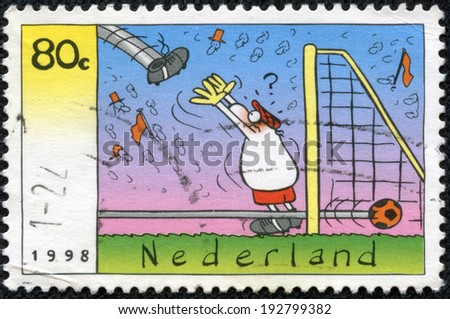NETHERLANDS - CIRCA 1998: A stamp printed in Netherlands showing a soccer goalie cartoon, circa 1998