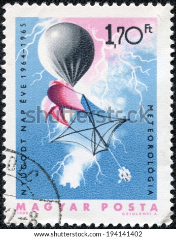 HUNGARY CIRCA 1965: stamp printed by Hungary, shows Weather balloon and lightning, meteorology, circa 1965
