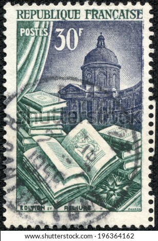 FRANCE - CIRCA 1954: A stamp printed in France dedicated to Book manufacture, in the background of the dome of the French Academy, circa 1954