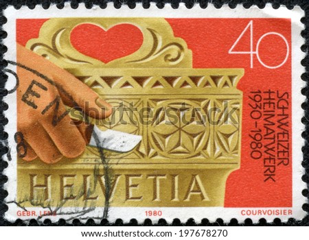 SWITZERLAND - CIRCA 1980: a stamp printed in the Switzerland shows Hand Carved Milk Bucket, Work at Home, circa 1980