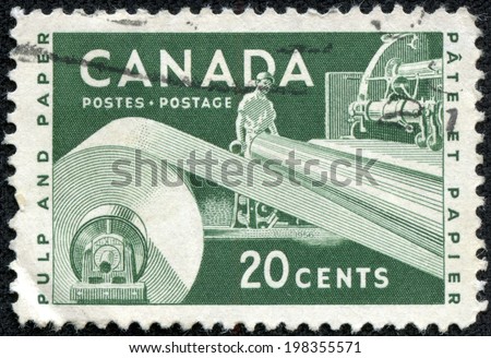 CANADA - CIRCA 1953: A stamp printed in Canada shows machine tool for manufacture of paper, devoted Pulp and Paper Industry, circa 1953