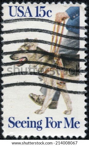 UNITED STATES OF AMERICA - CIRCA 1979 : A stamp printed in the USA shows guide dog, Seeing for me, circa 1979
